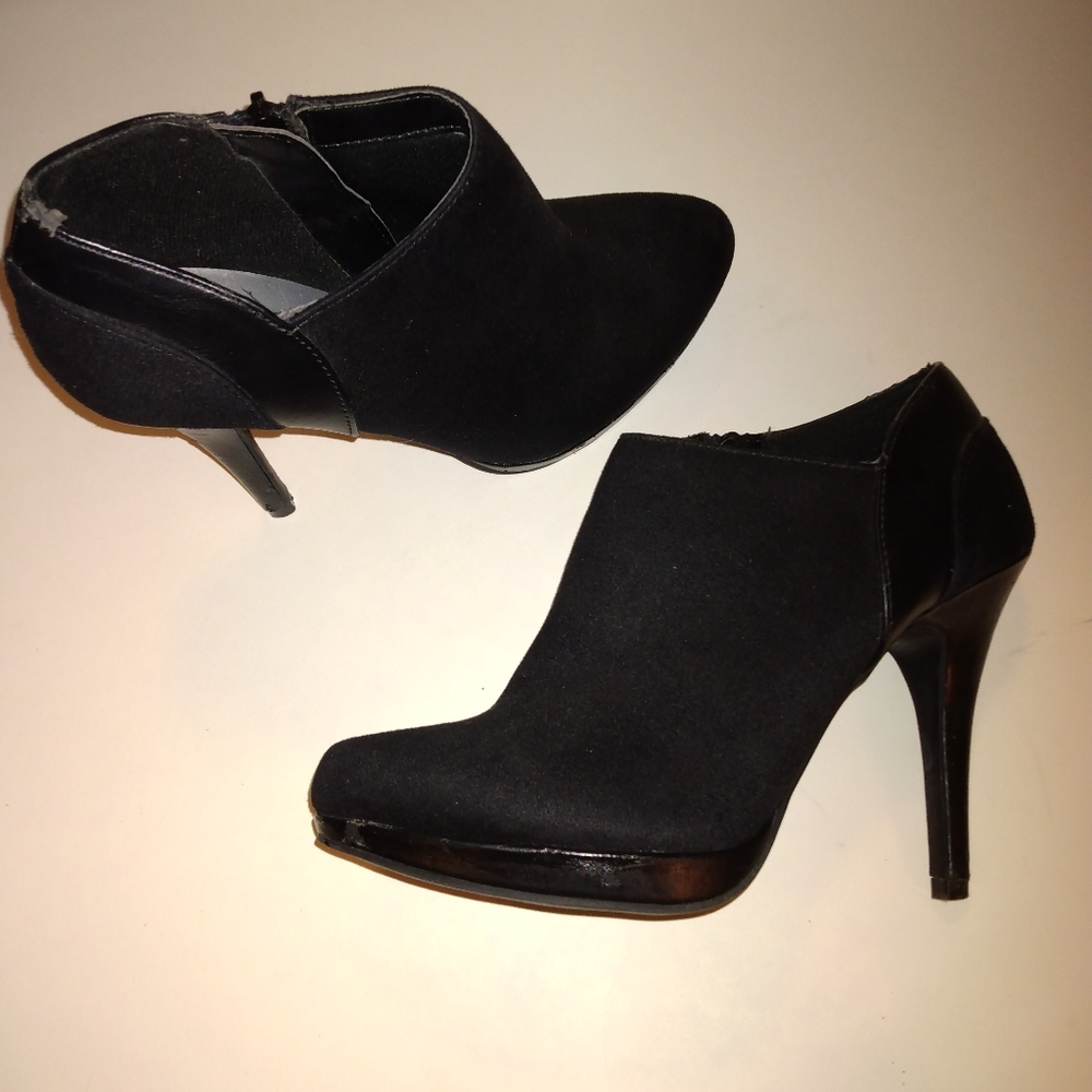 X-Appeal size 37/8 Black bootie/shoe 4" heel and in excellent condition.